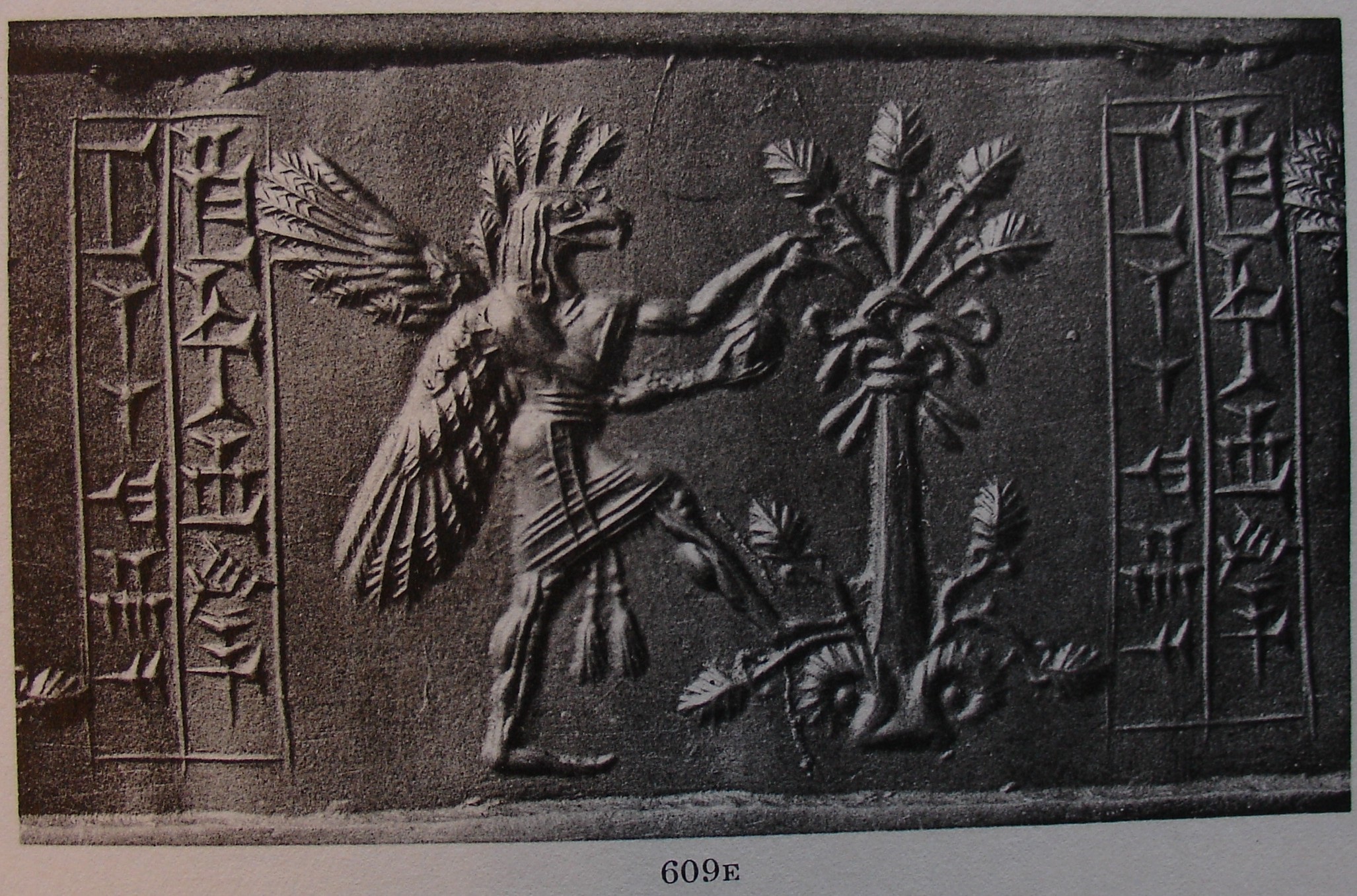 Bird-headed apkallu (griffin-demon) breaking branch of stylised tree