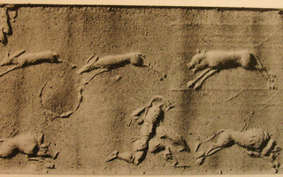 Two Greek hoplites hunting various animals