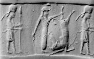 Hero fighting bull while armed attendant (spearman) stands behind