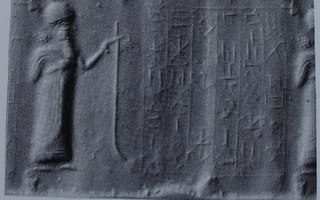 King or dignitary holding long, curved staff