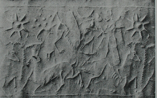 Dual scene: Winged hero fighting griffin while two mouflons facing each other