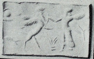 Winged hero fighting human-headed winged lion (lamassu, sphinx)