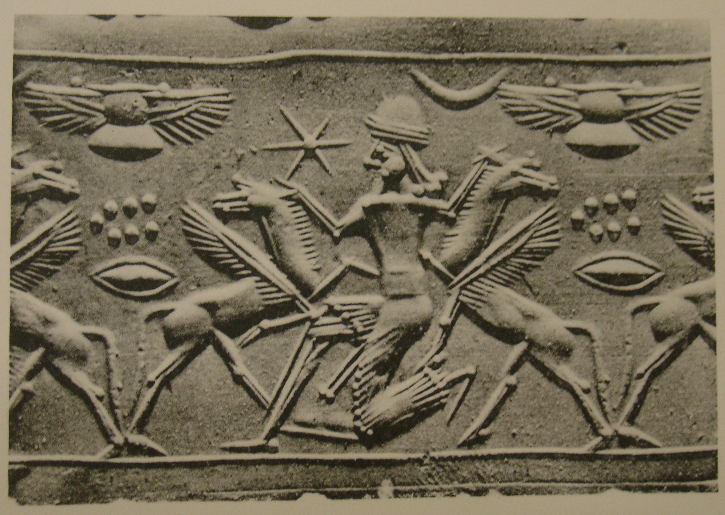 Hero grasping winged horse on either side