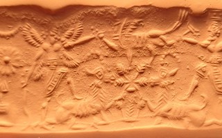 Winged hero and hero fighting human-headed winged lion (lamassu, sphinx) above stylized tree while standing on two wild goats (ibexes)