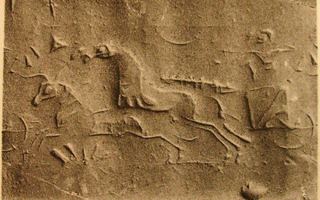 Archer hunting bull from chariot