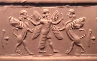 Winged hero grasping human-headed winged lion (shedu, sphinx) on either side