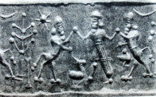 Hero grasping human-headed lion (sphinx) on either side