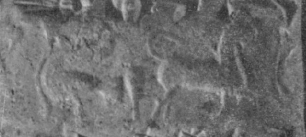 Bird-man facing prancing bull