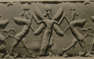 Winged hero grasping human-headed winged lion (shedu, sphinx) on either side