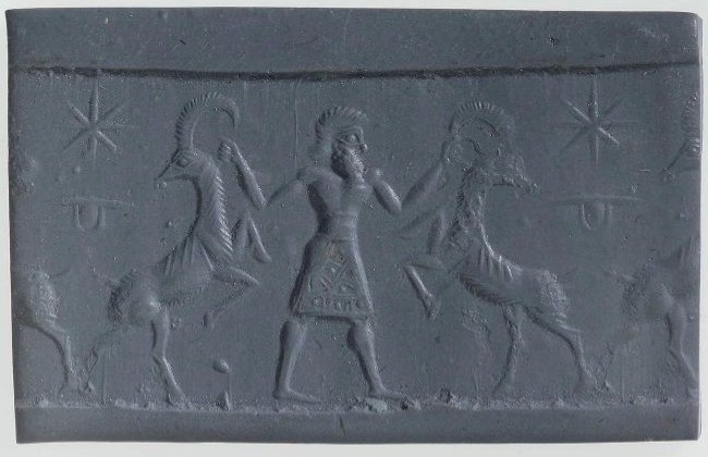 Hero grasping wild goat (ibex) on either side