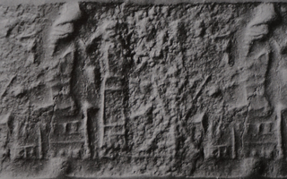 Table between king sitting on throne and his attendant