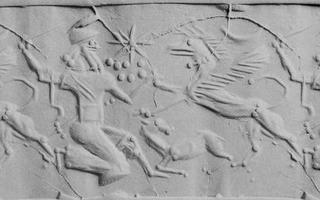 Hero fighting griffin over small quadruped