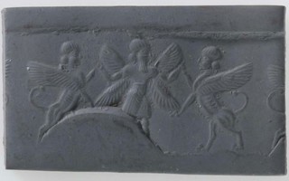 Winged hero grasping human-headed winged lion (lamassu, sphinx) on either side